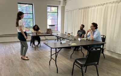 Group public speaking practice in person