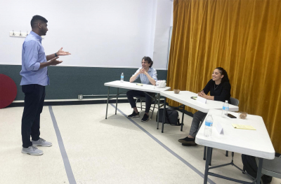 Group doing a public speaking class live
