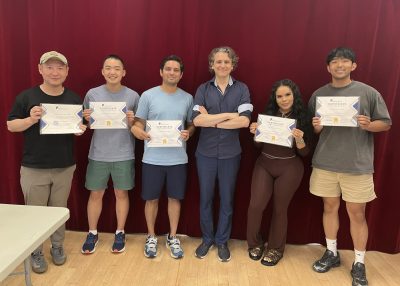 A group photo of Herman's public speaking class in Midtown.