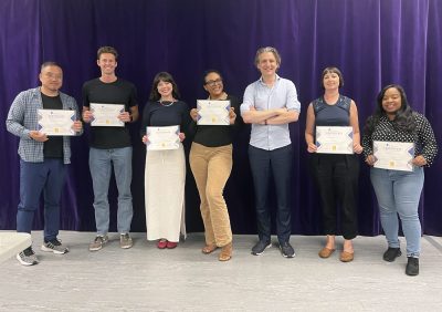 A photo of the public speaking class taken at the end.