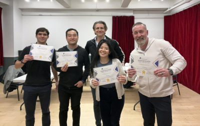 Herman Otten teaching a group presentation skills