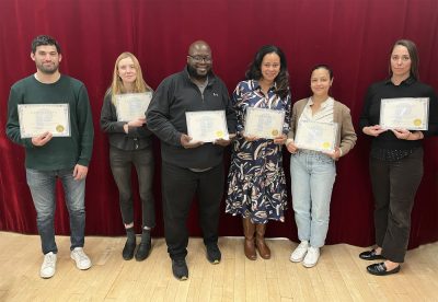 Herman's public speaking class in NYC was a great success and the participants are smiling for camera.