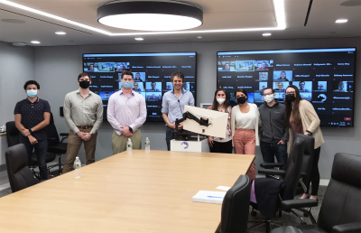 Professional speaking in public session with Wolfe Research